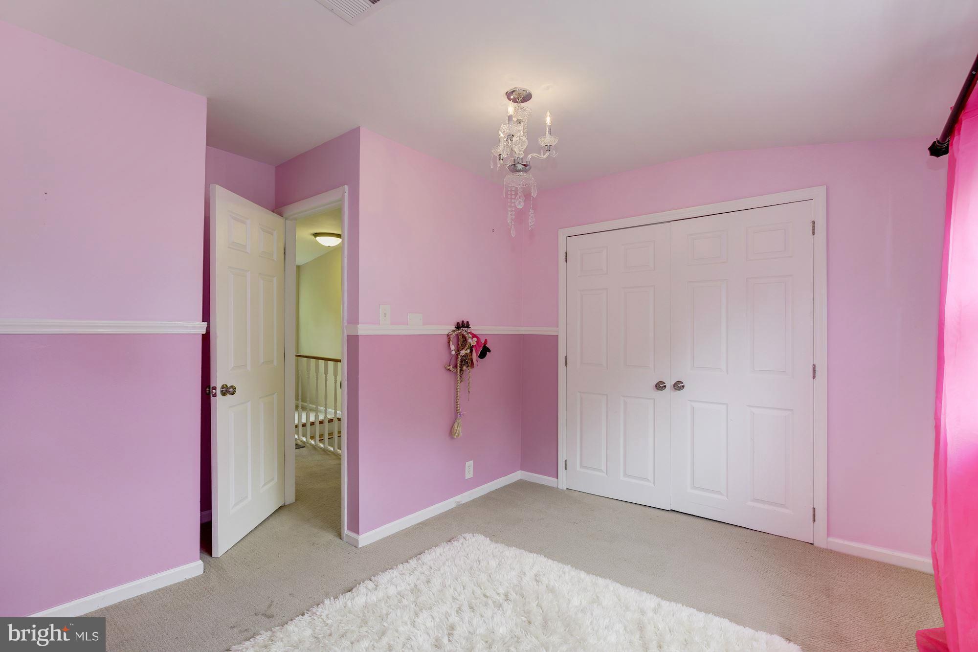 11601 Mapleview Drive Silver Spring, MD 20902 - Photo 11 of 23 an empty room with a mirror