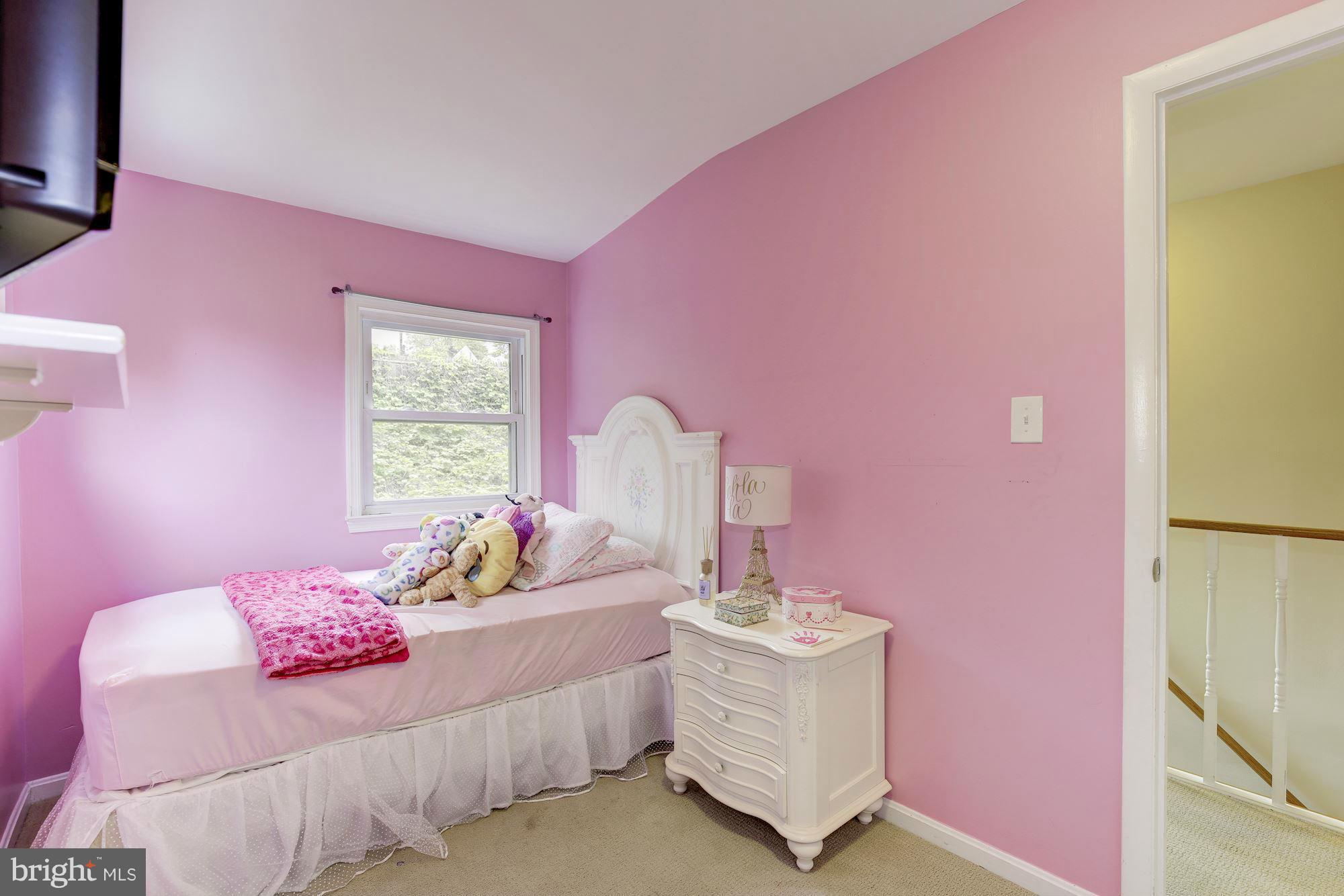 11601 Mapleview Drive Silver Spring, MD 20902 - Photo 13 of 23 a bed room with a bed and a couch