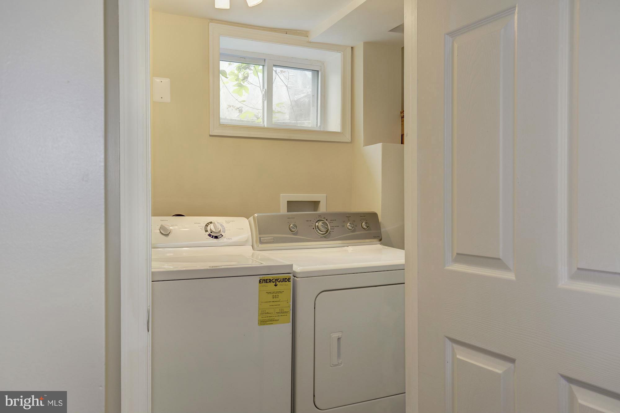 11601 Mapleview Drive Silver Spring, MD 20902 - Photo 19 of 23 a utility room with dryer and washer