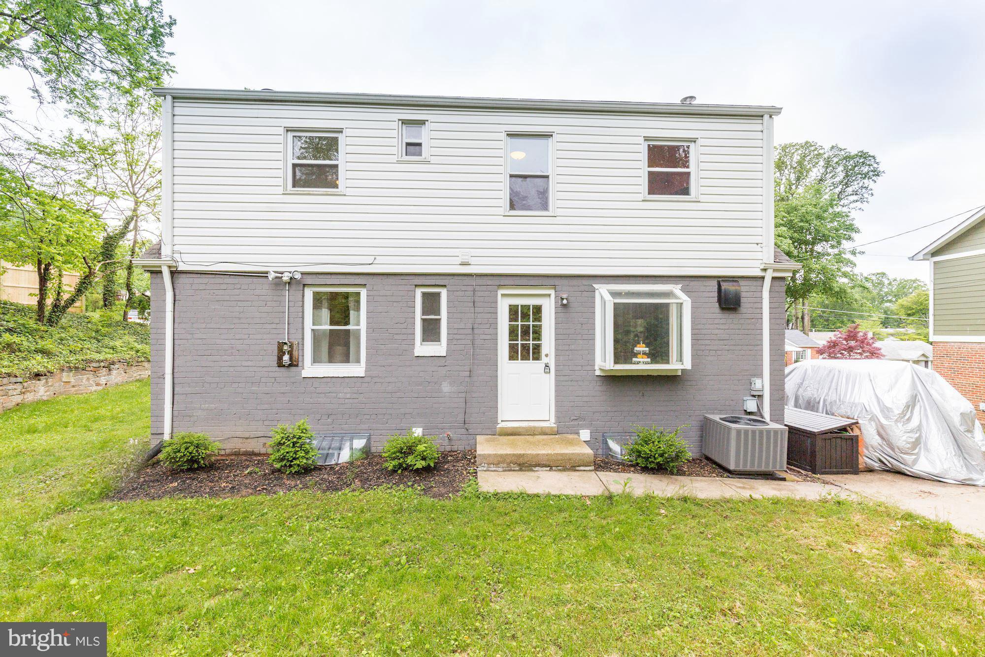 11601 Mapleview Drive Silver Spring, MD 20902 - Photo 22 of 23 a view of a house with backyard and sitting area