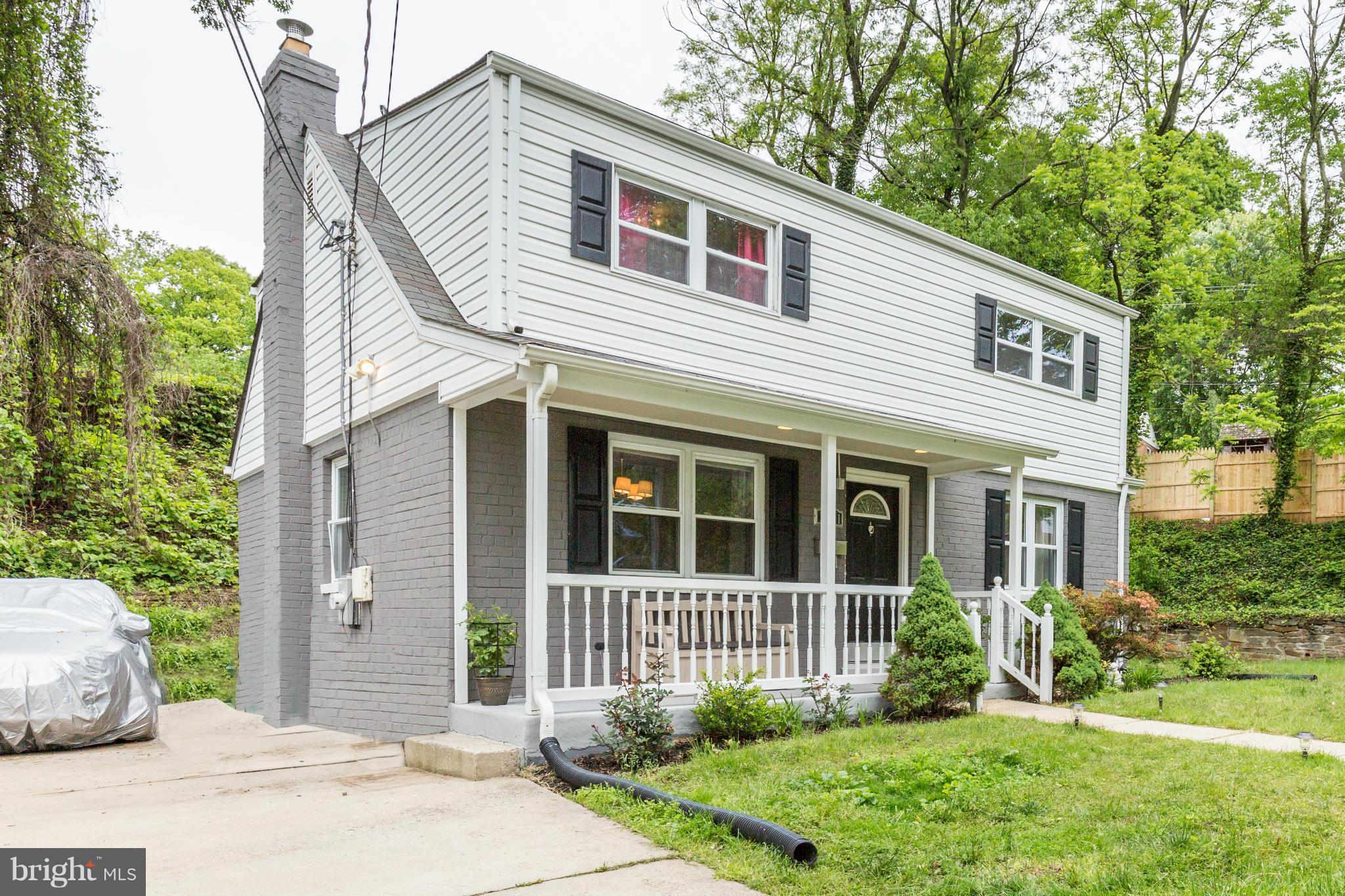 11601 Mapleview Drive Silver Spring, MD 20902 - Photo 23 of 23 a front view of a house with garden
