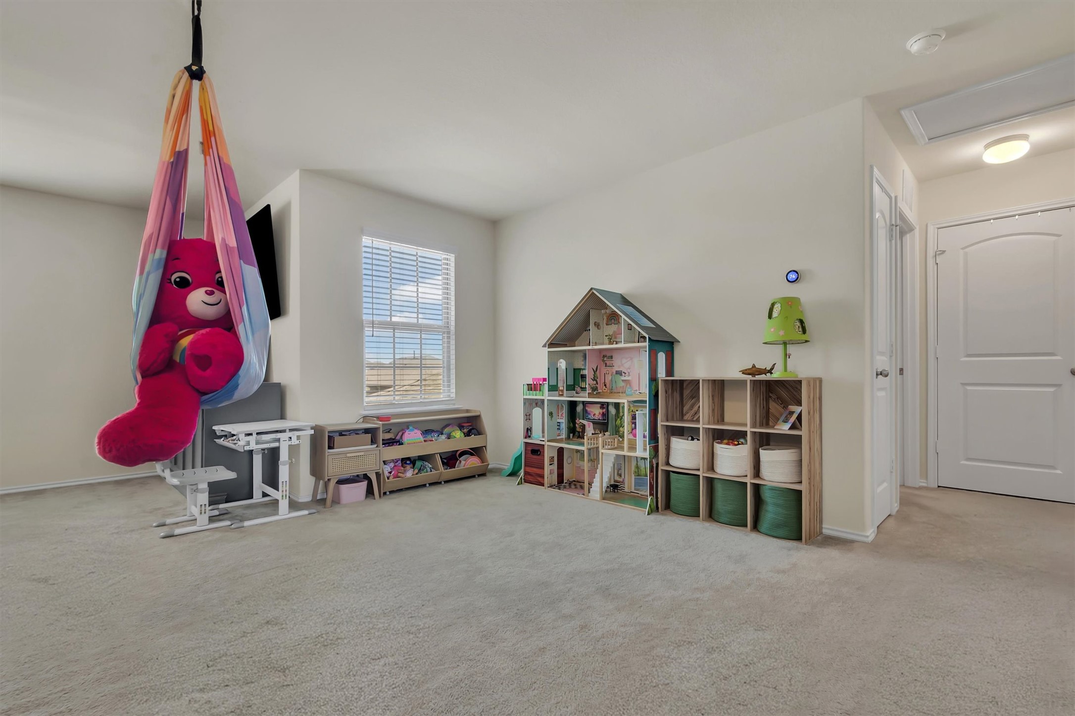 11701 Jackson Falls Way Manor, TX 78653 - Photo 23 of 40 A versatile bonus room offers ample space for recreation and creative pursuits.