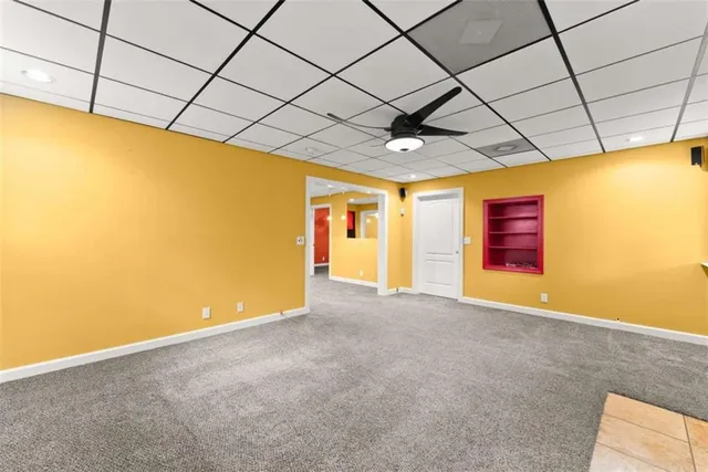 a view of a backyard of the house