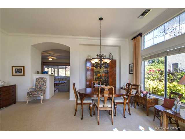 2230 Masters Road Carlsbad, CA 92008 - Photo 4 of 24 Large Formal Dining Room. Beautiful transom leaded window.