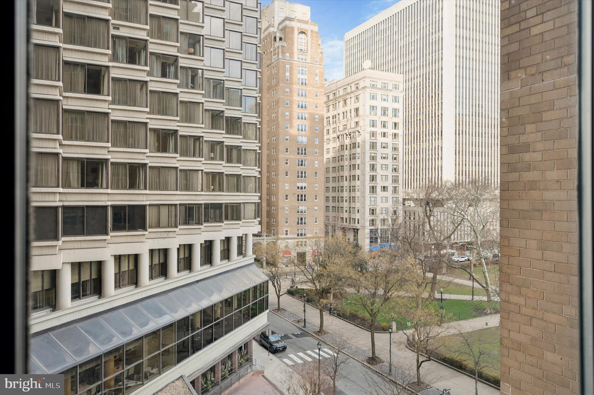 220 West Rittenhouse Square, Unit 6F Philadelphia, PA 19103 - Photo 2 of 26 a view of a large building from a window