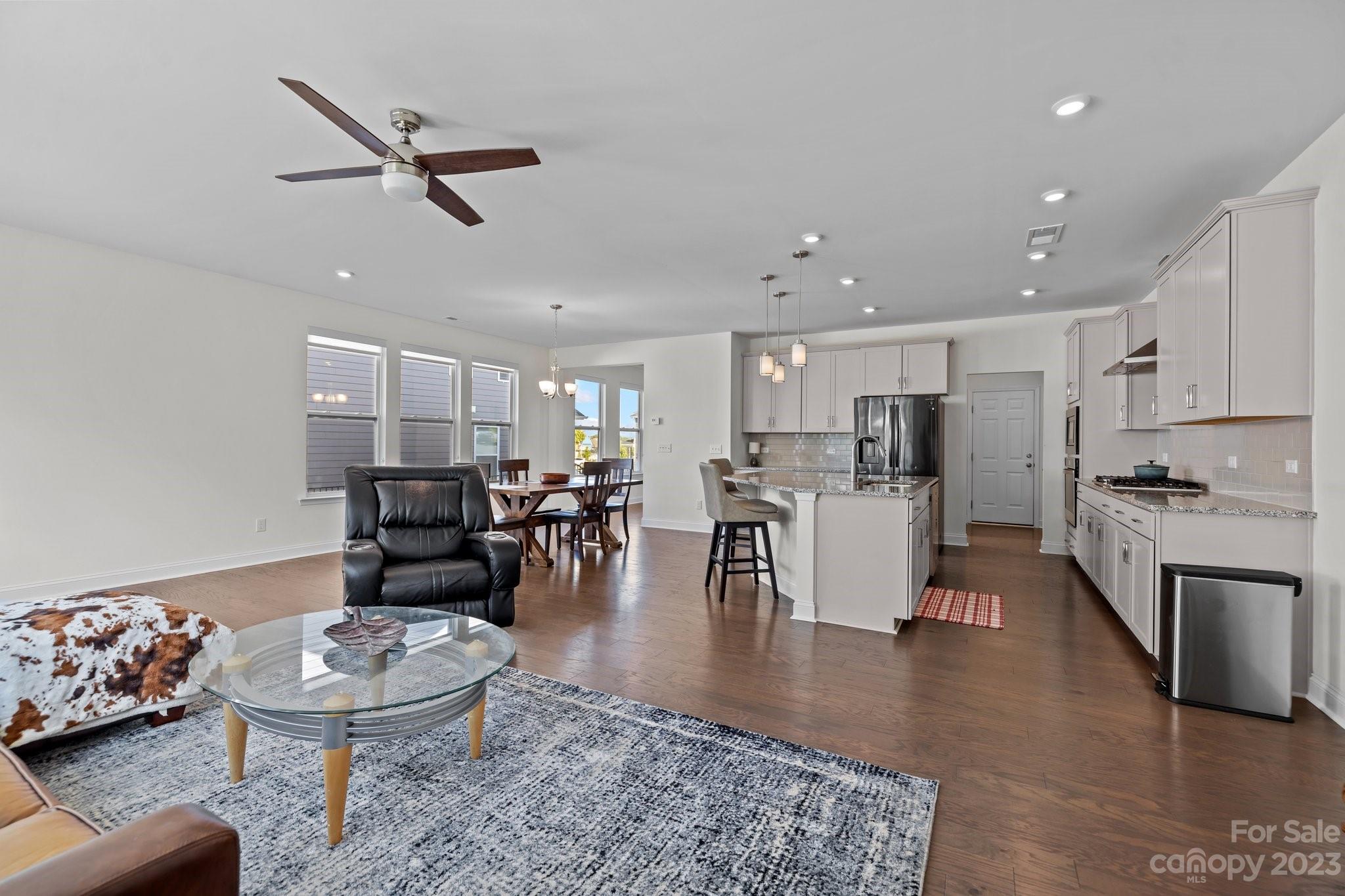 2075 Suttonview Road Fort Mill, SC 29708 - Photo 12 of 39 a living room with furniture and kitchen view