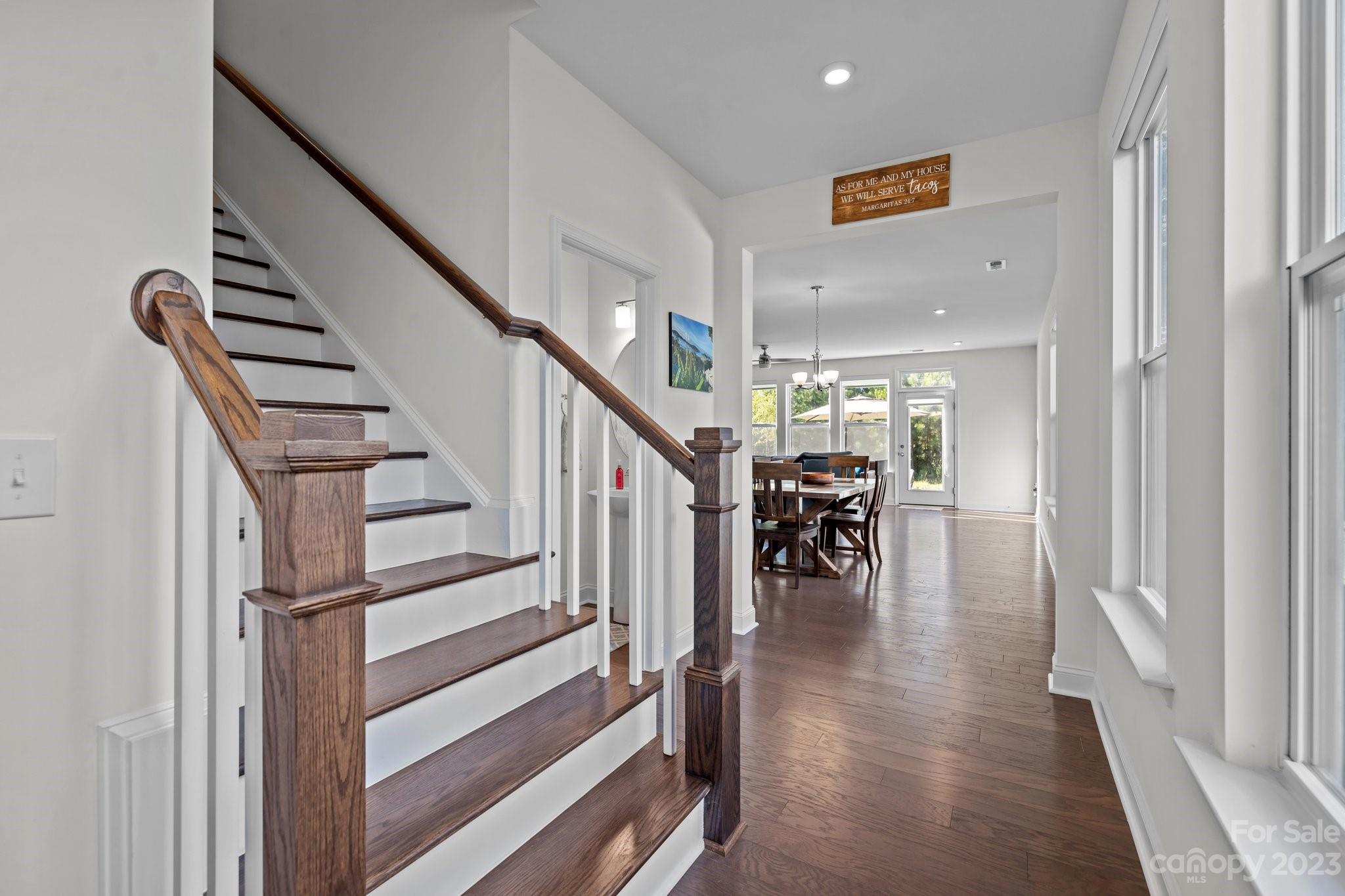 2075 Suttonview Road Fort Mill, SC 29708 - Photo 2 of 39 a hallway with wooden floor and furniture