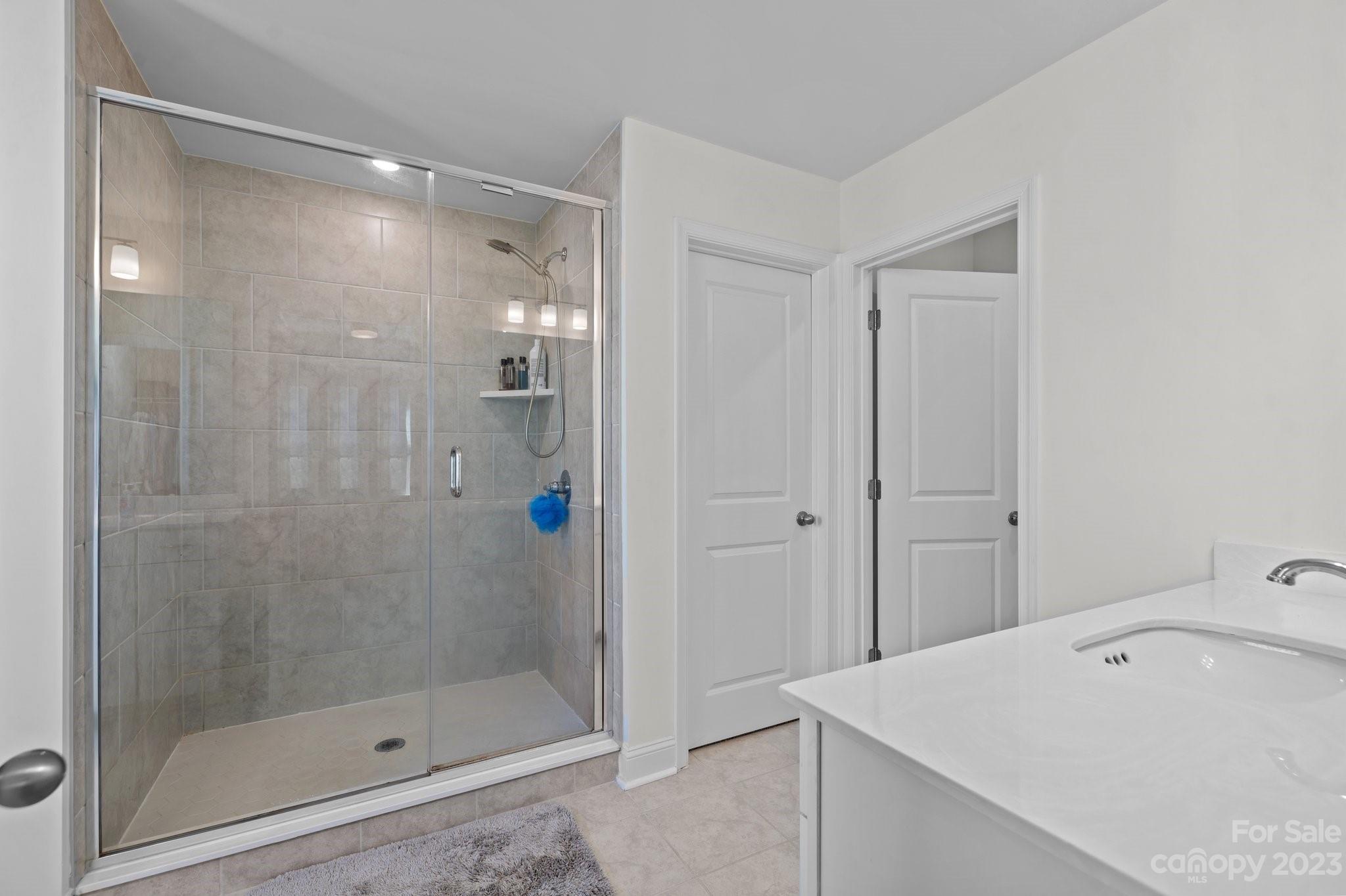 2075 Suttonview Road Fort Mill, SC 29708 - Photo 23 of 39 a bathroom with a shower and a sink