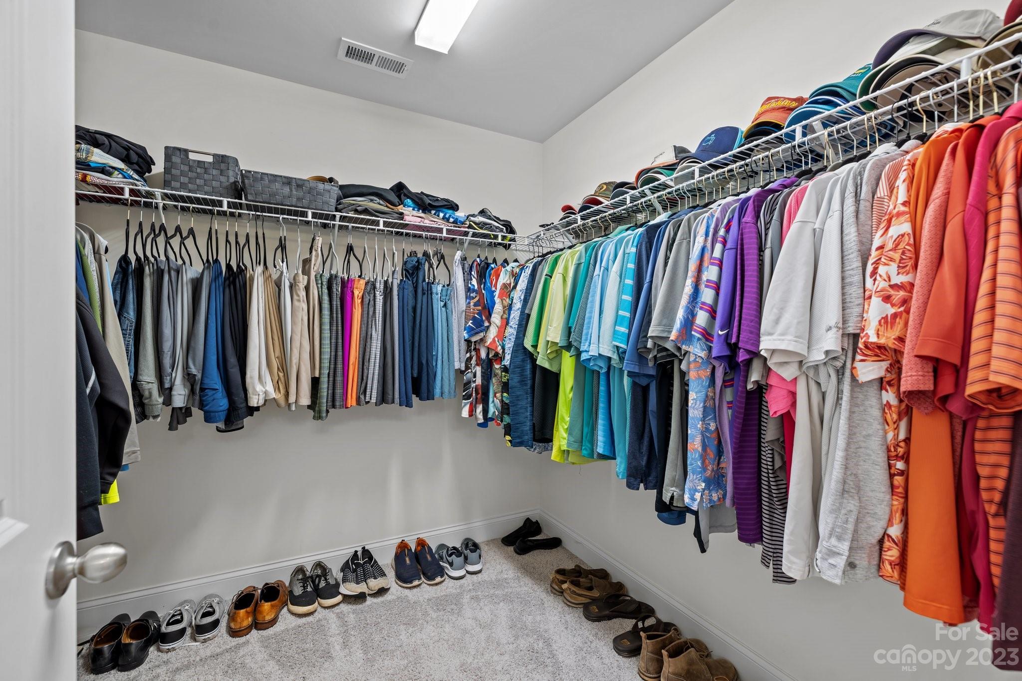 2075 Suttonview Road Fort Mill, SC 29708 - Photo 25 of 39 a view of walk in closet with clothes and shoes