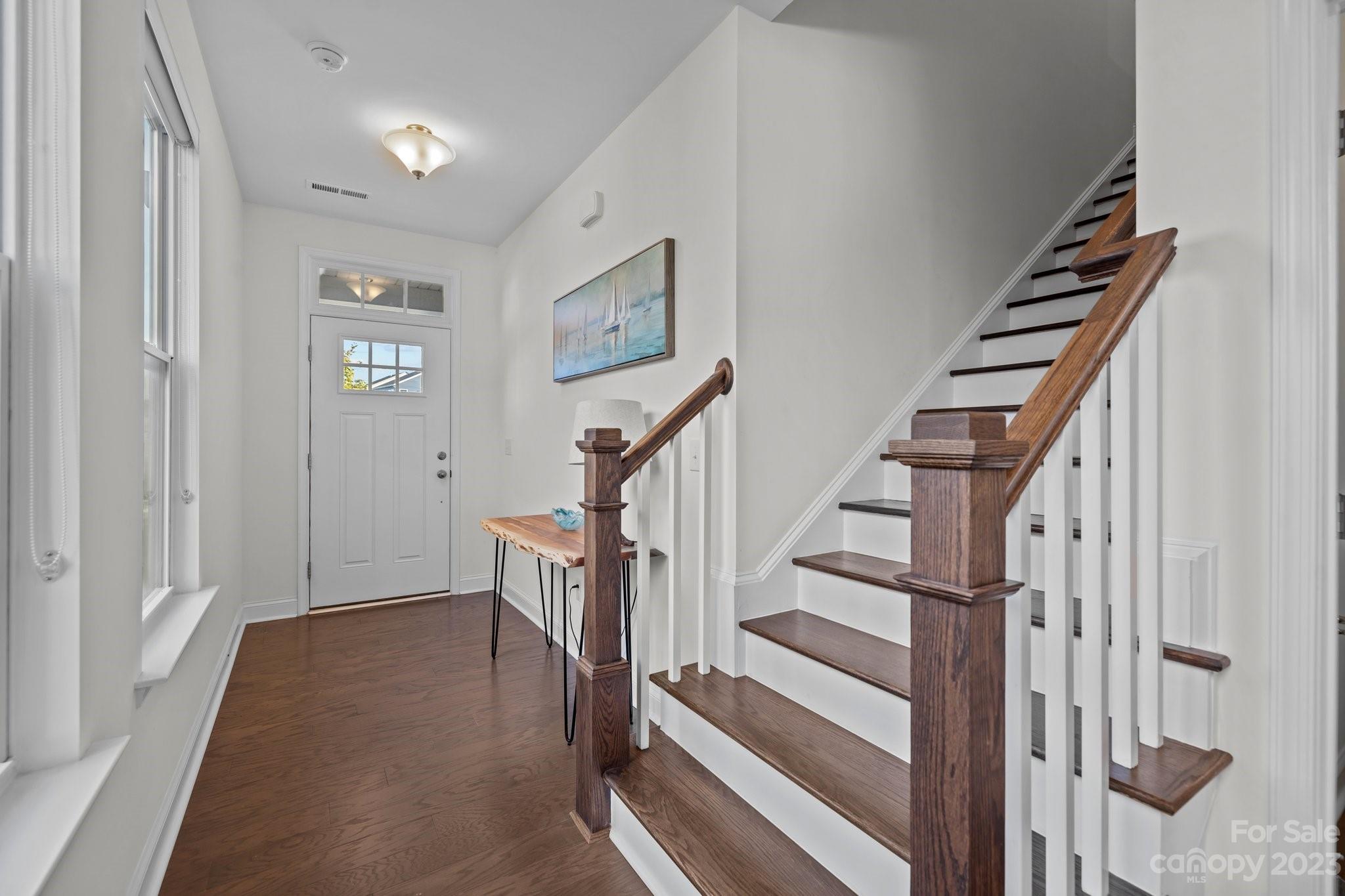 2075 Suttonview Road Fort Mill, SC 29708 - Photo 26 of 39 a view of entryway with wooden floor and stairs