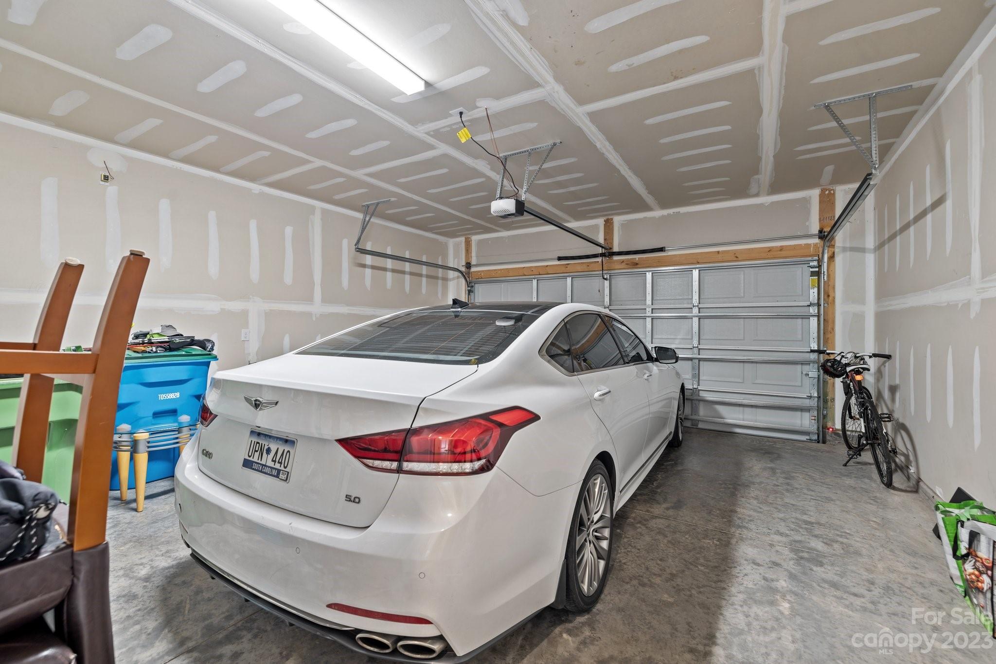 2075 Suttonview Road Fort Mill, SC 29708 - Photo 27 of 39 a white car parked in a garage