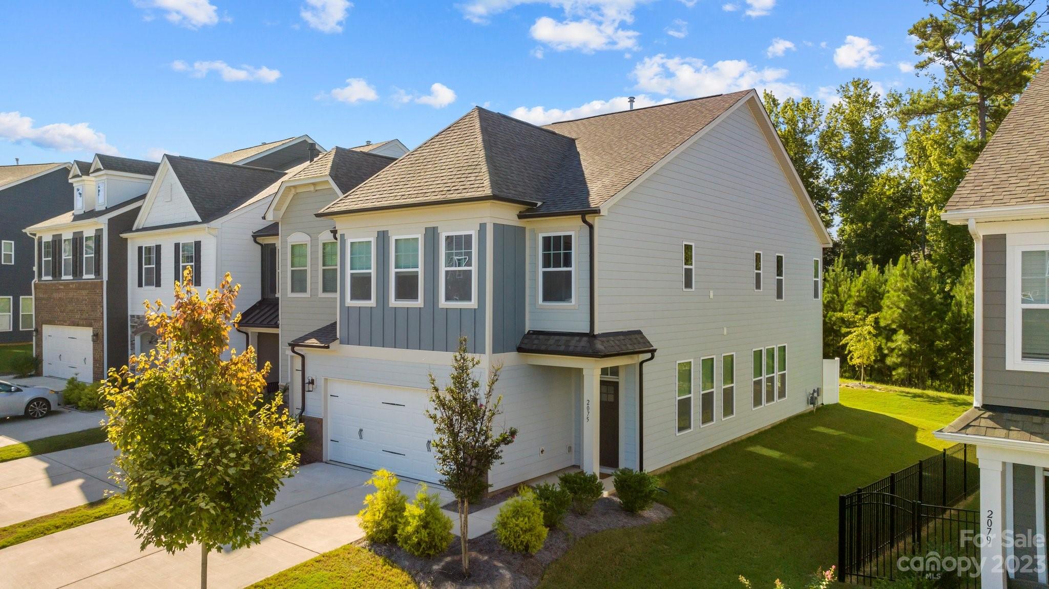 2075 Suttonview Road Fort Mill, SC 29708 - Photo 28 of 39 a front view of a house with garden