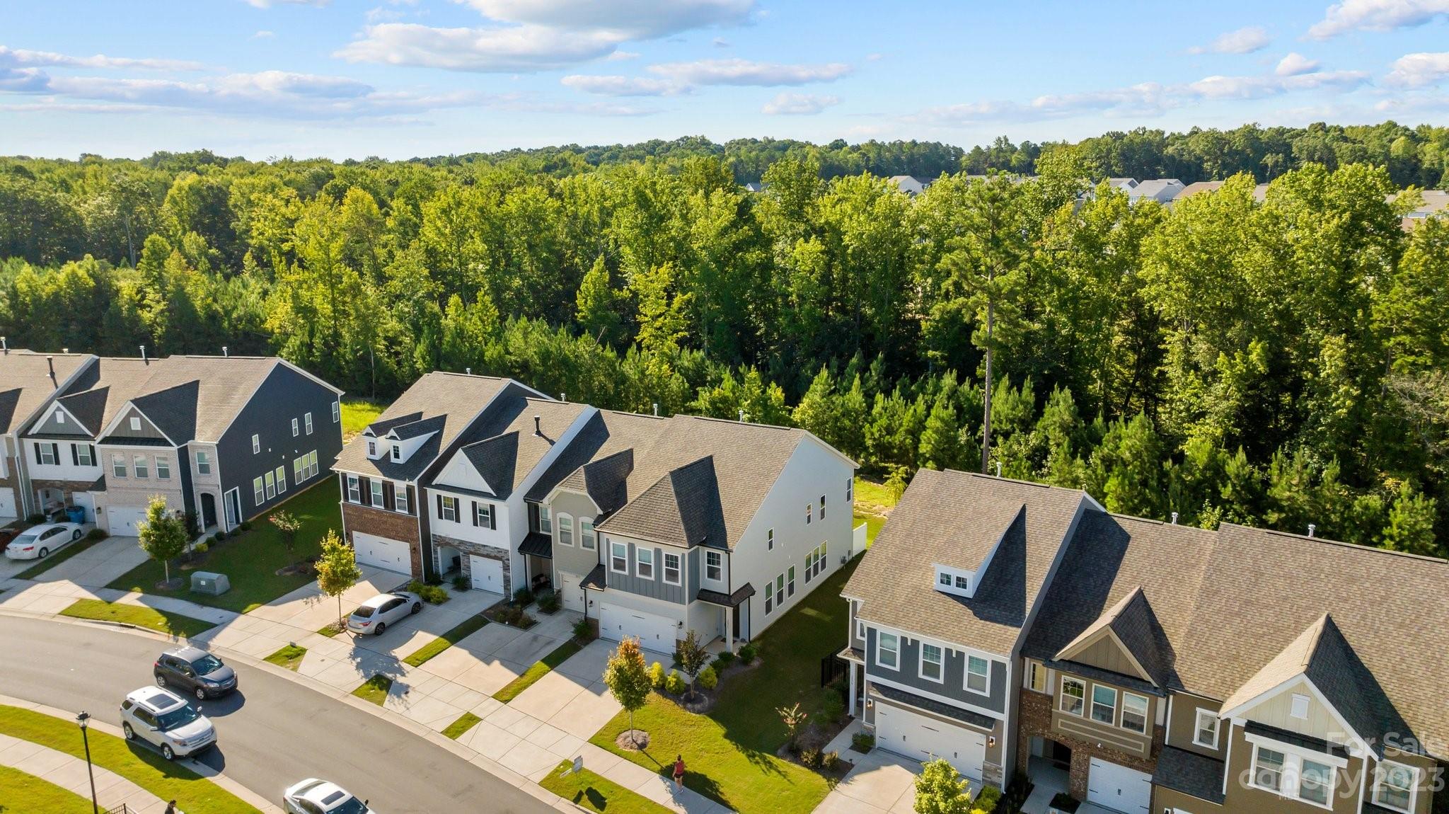 2075 Suttonview Road Fort Mill, SC 29708 - Photo 34 of 39 an aerial view of multiple houses with yard