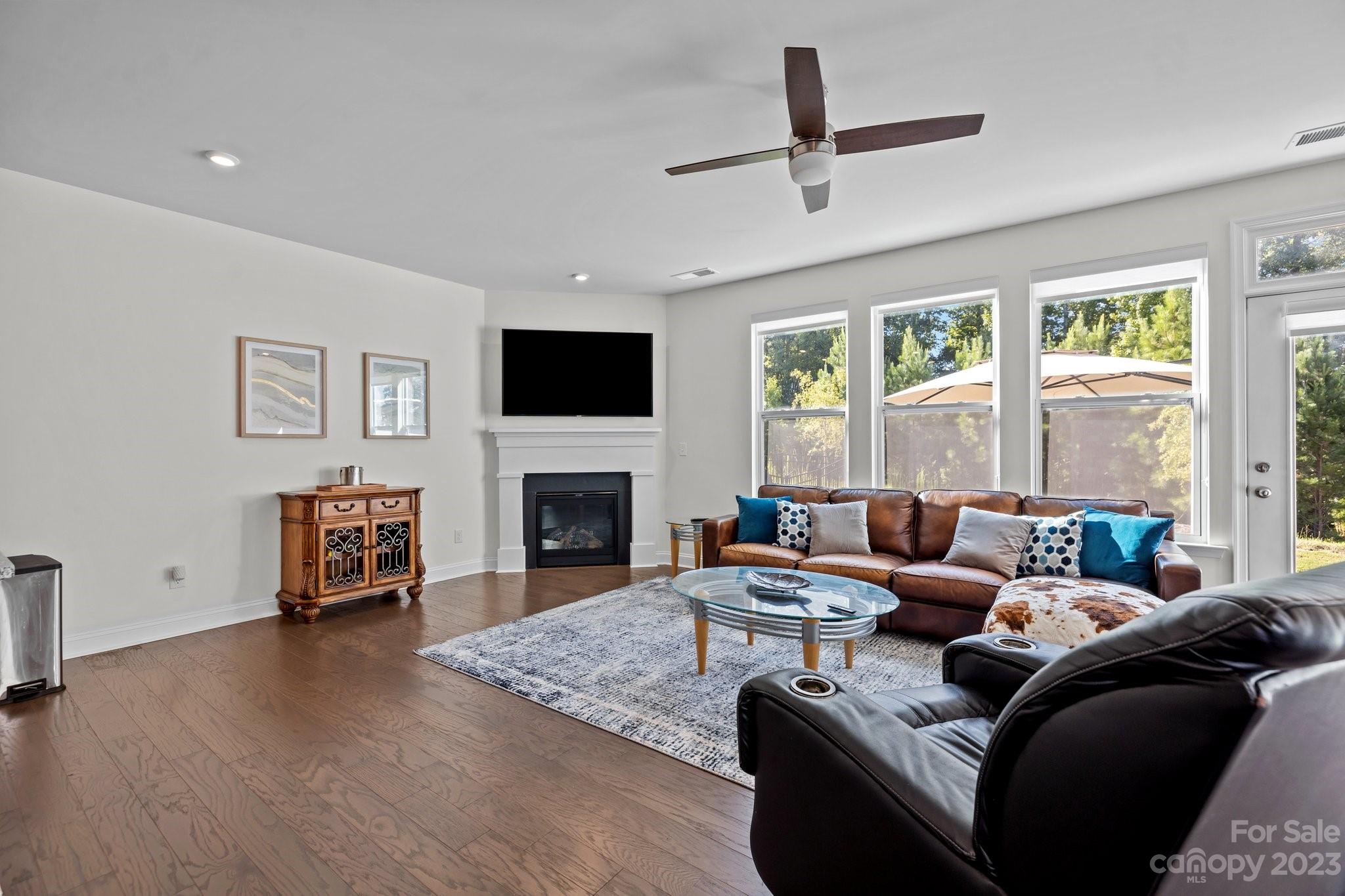 2075 Suttonview Road Fort Mill, SC 29708 - Photo 9 of 39 a living room with furniture or fireplace and a flat screen tv