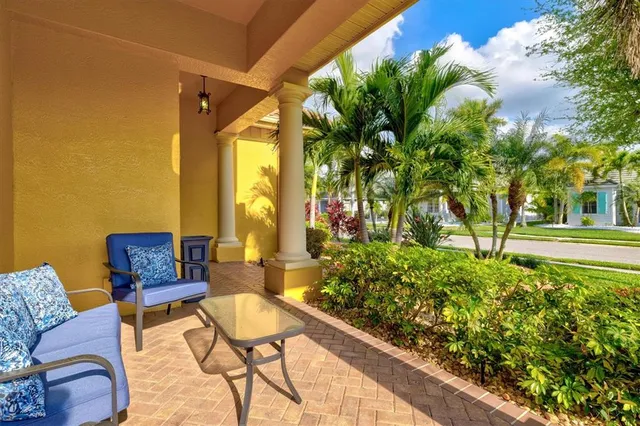 a view of a dining room with furniture window and chandelier