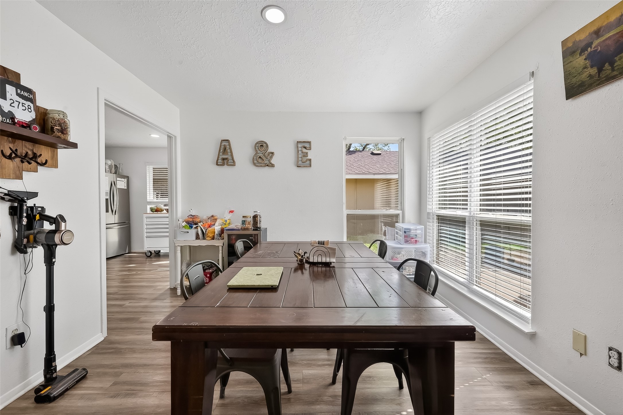 2526 Spring Dusk Drive Spring, TX 77373 - Photo 11 of 33 a view of a dining room with furniture and window