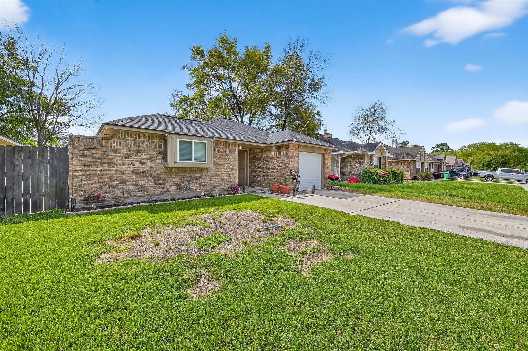2526 Spring Dusk Drive Spring, TX 77373 - Photo 2 of 33 a front view of house with yard and green space