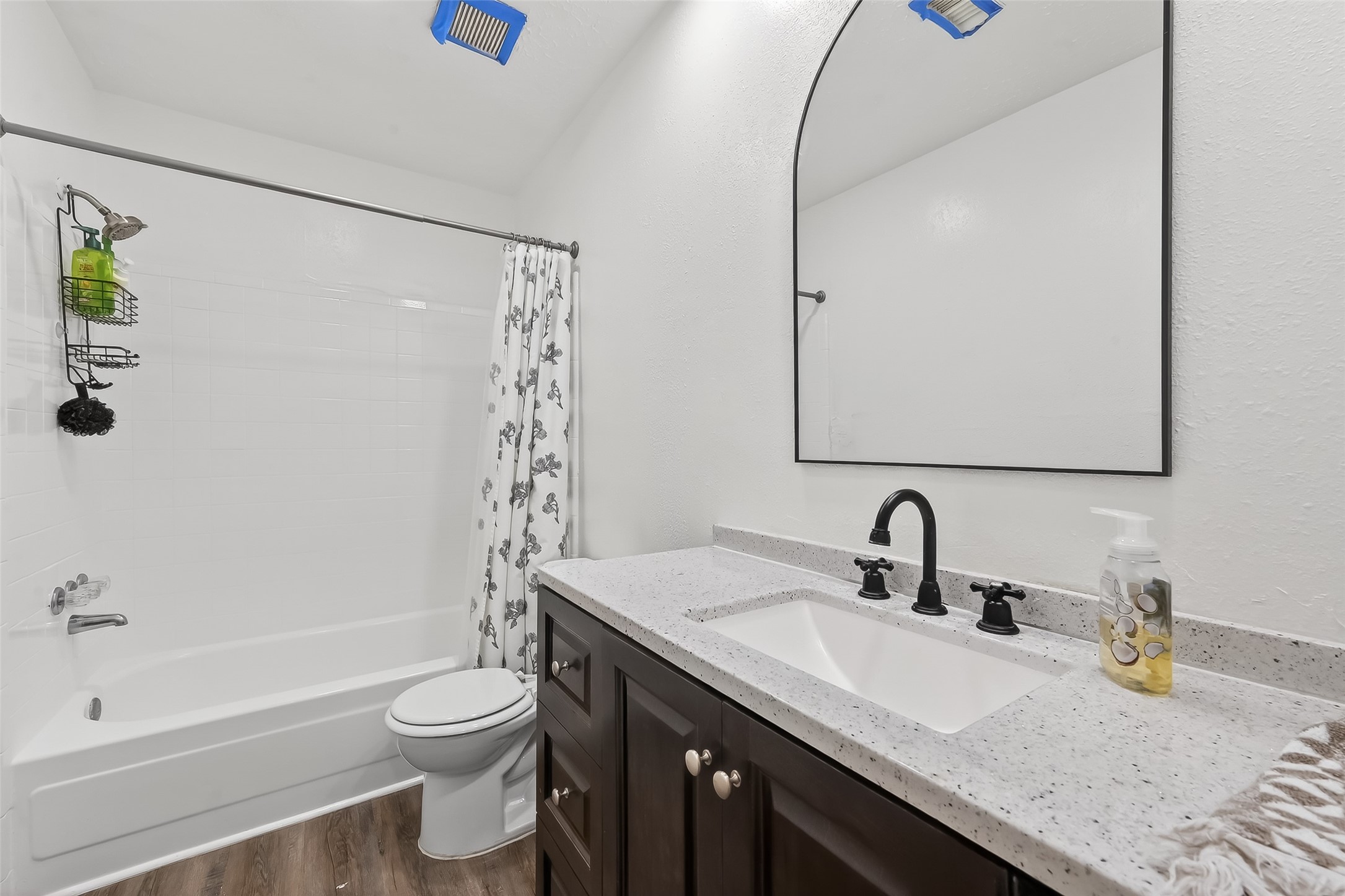 2526 Spring Dusk Drive Spring, TX 77373 - Photo 23 of 33 a bathroom with a granite countertop sink a toilet and shower