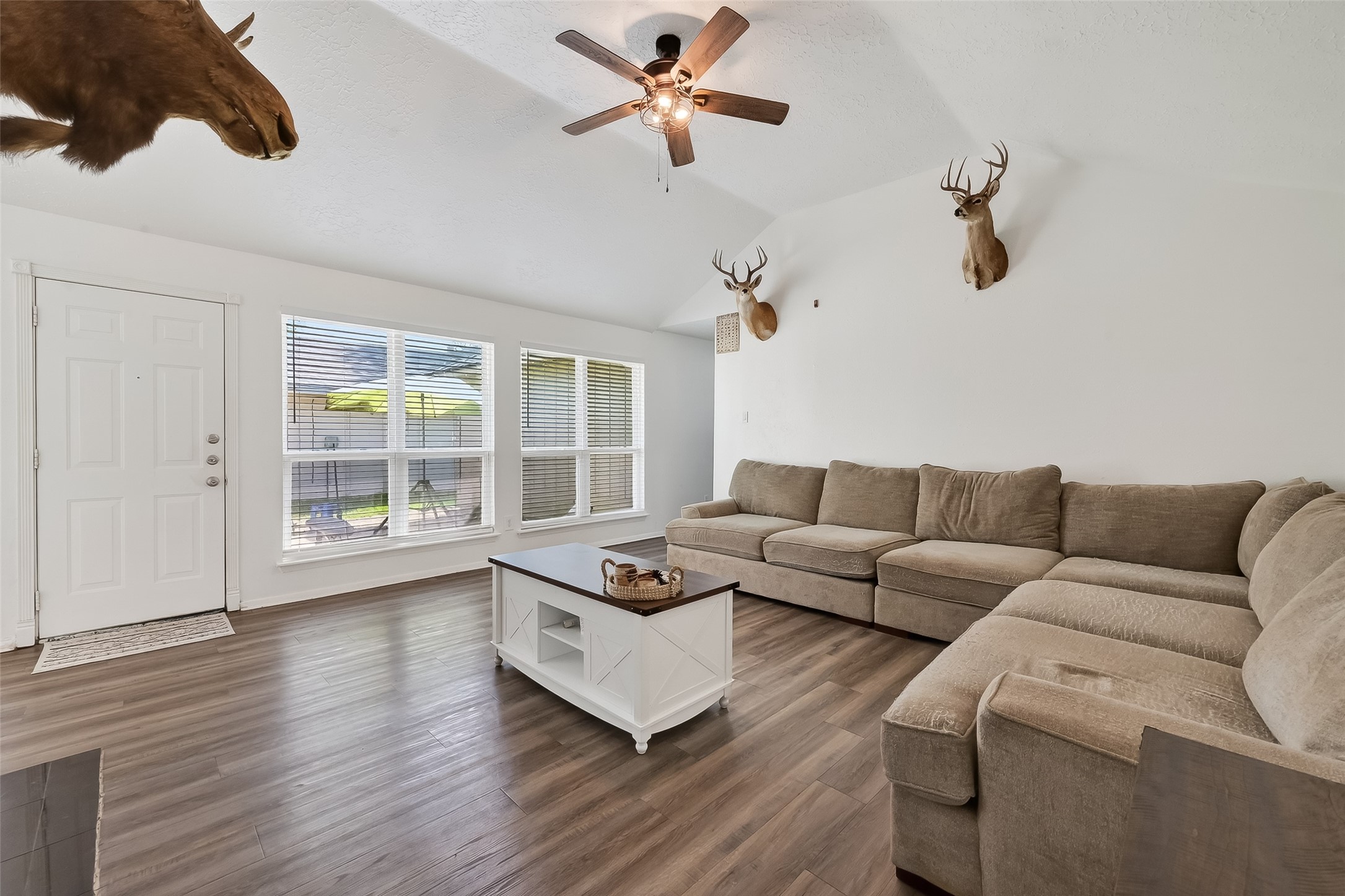 2526 Spring Dusk Drive Spring, TX 77373 - Photo 8 of 33 a living room with furniture and a window
