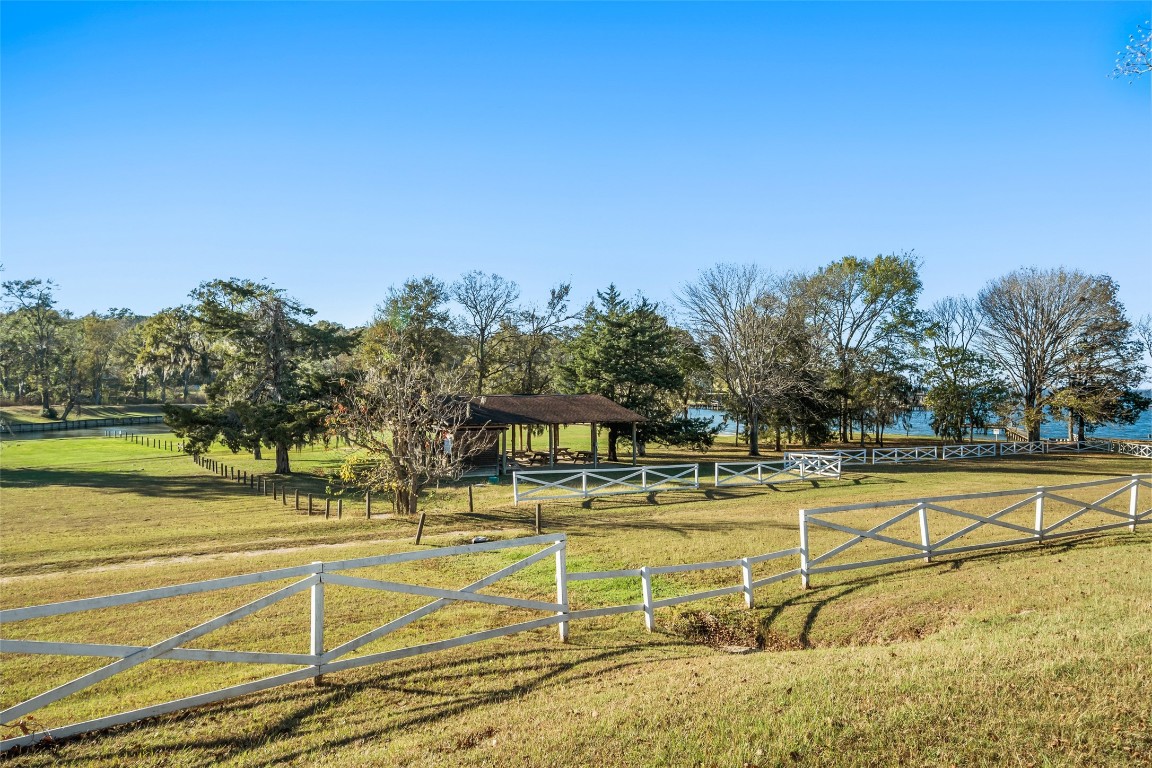 0 Paradise Drive Coldspring, TX 77331 - Photo 12 of 12 a view of a swimming pool with an outdoor space and seating area