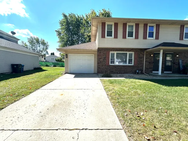 a view of outdoor space yard and front view of a house