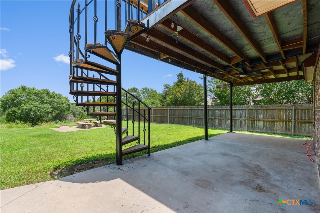 5203 Denmans Loop Belton, TX 76513 - Photo 22 of 26 Spiral Staircase Leading to Terrace off Primary Bedroom