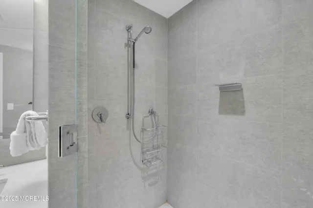 a bathroom with a toilet and shower