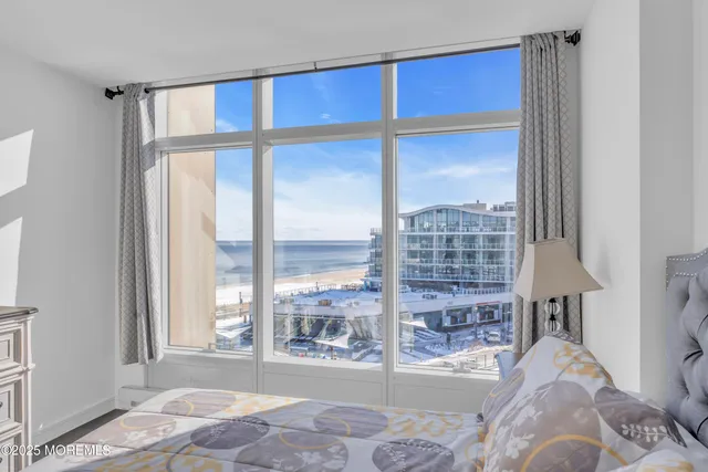 a bathroom with a sink toilet and mirror