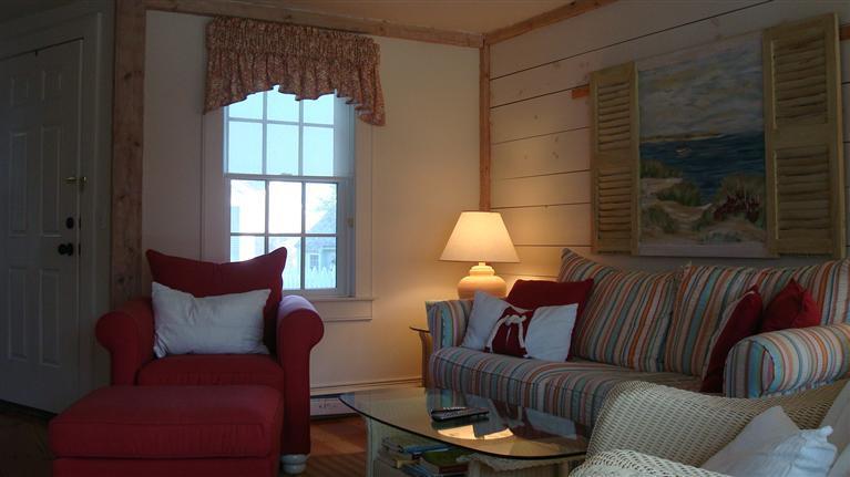18 Brant Rock Road, Unit 18 Mashpee, MA 02649 - Photo 6 of 13 a living room with furniture and a window