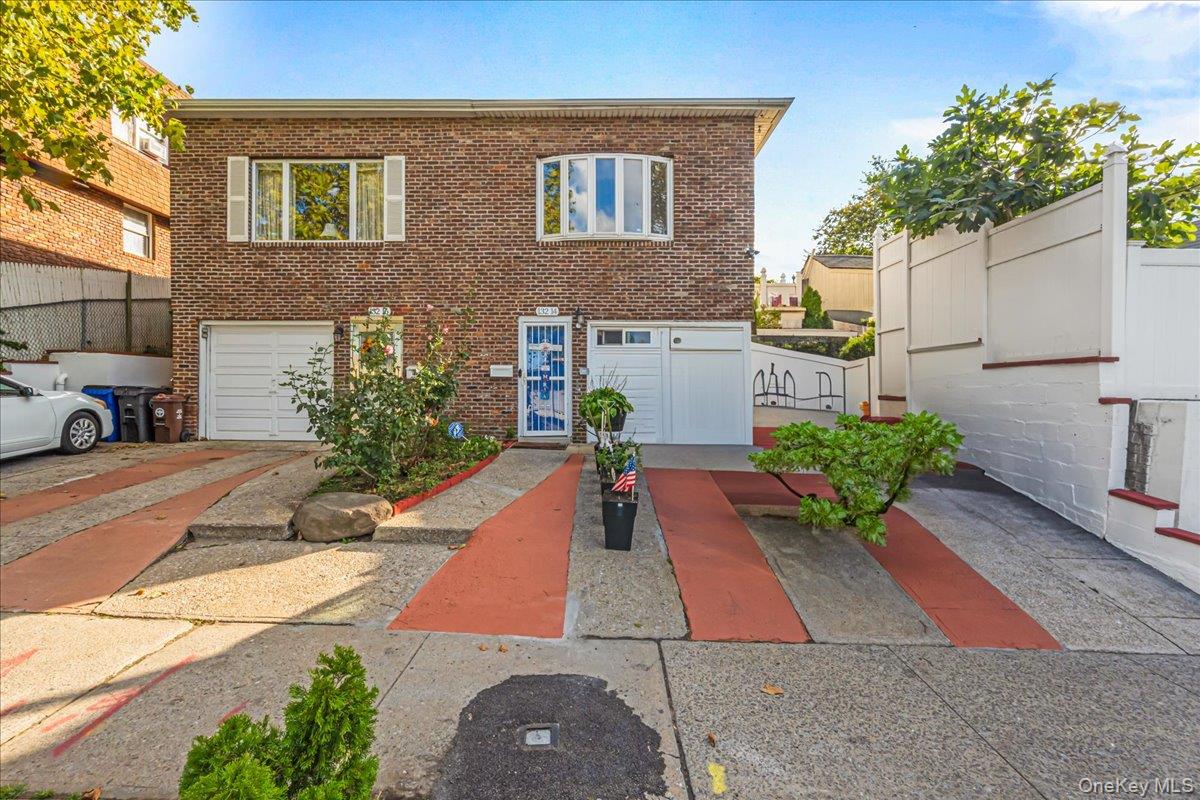 132-14 Horace Harding Expressway Queens, NY 11367 - Photo 2 of 25 View of front of house with brick siding