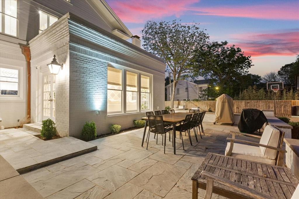 410 Rice Avenue Waco, TX 76708 - Photo 37 of 40 a view of a patio with a table and chairs