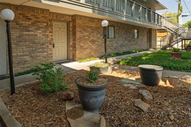 a view of a porch with seating space