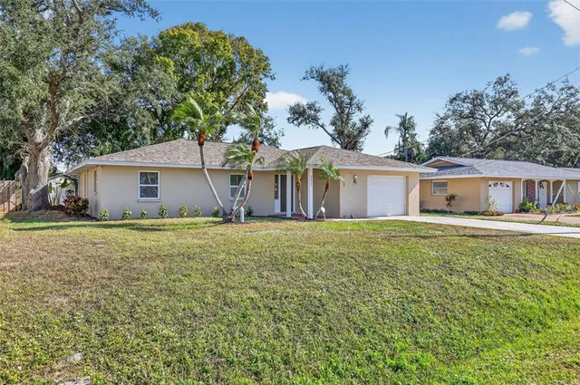 a front view of house with yard and seating area