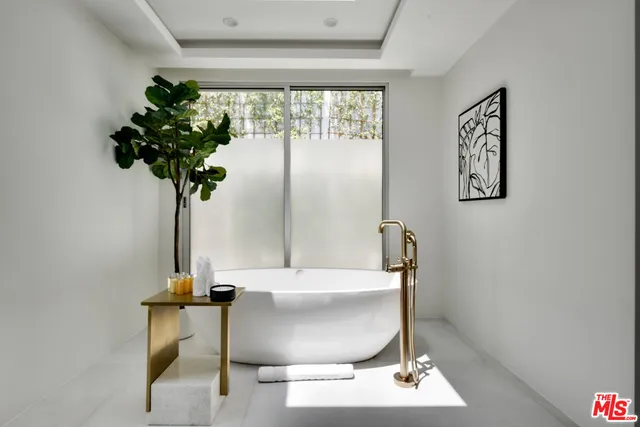 a vase of flowers sitting on a table