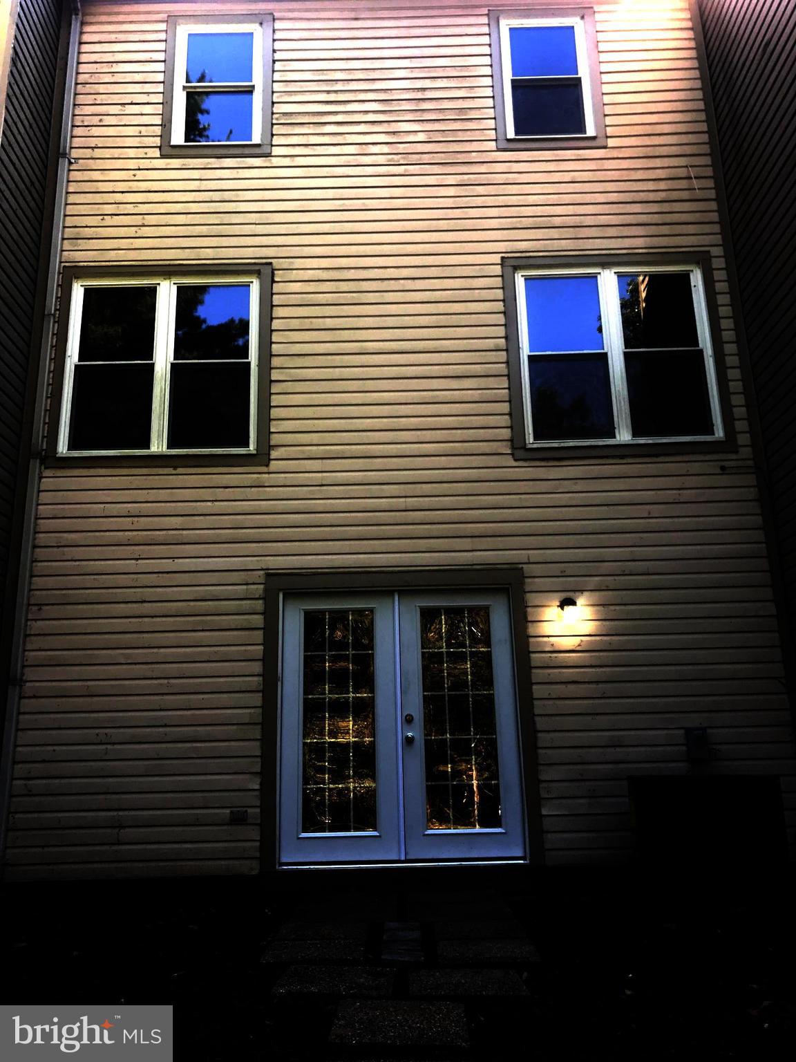 73 Kinsman Silver Spring Silver Spring, MD 20901 - Photo 2 of 9 a view of a brick house with windows