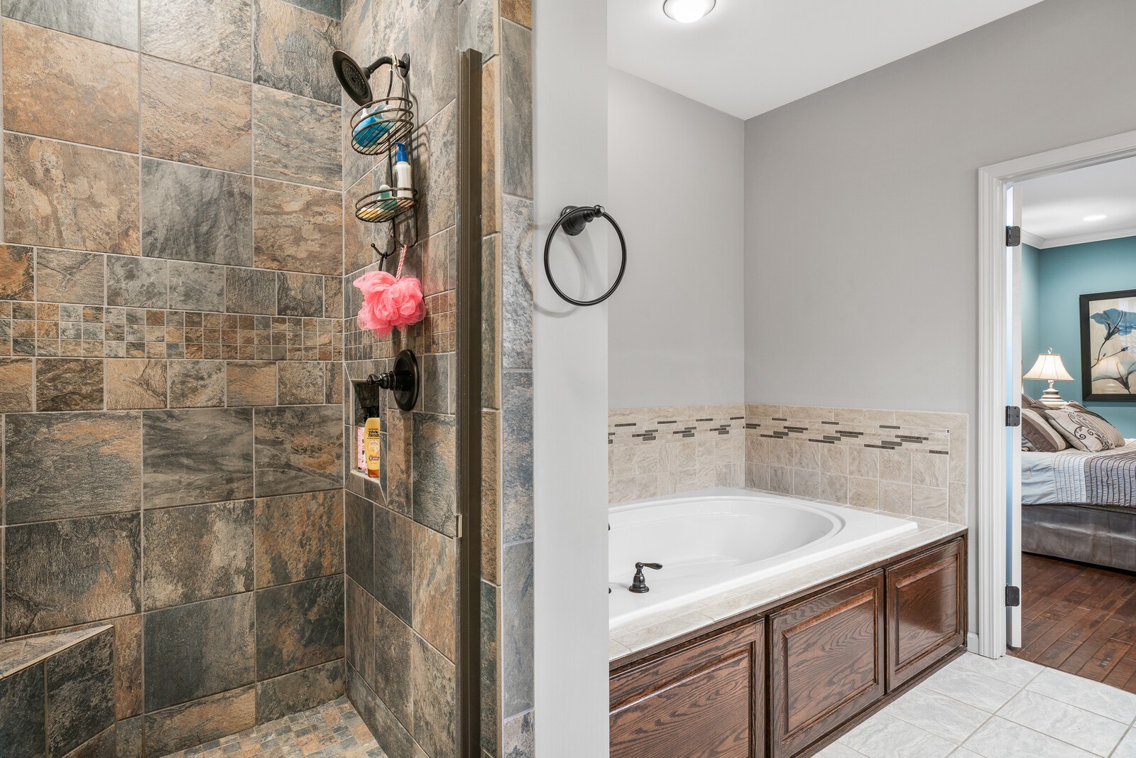 642 Campground Road Livingston, TN 38570 - Photo 13 of 49 a bathroom with a tub sink shower and mirror