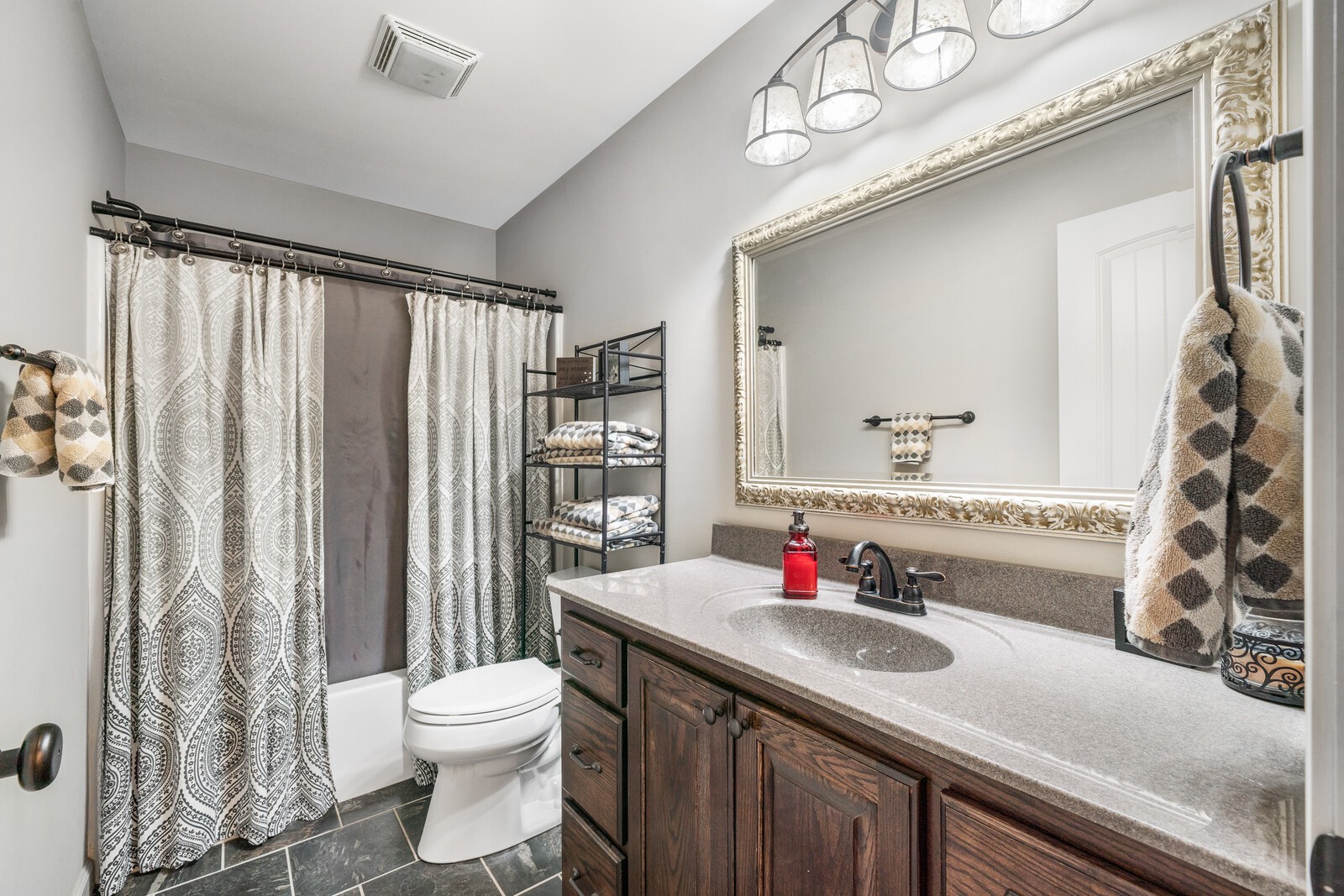 642 Campground Road Livingston, TN 38570 - Photo 18 of 49 a bathroom with a sink vanity mirror and toilet