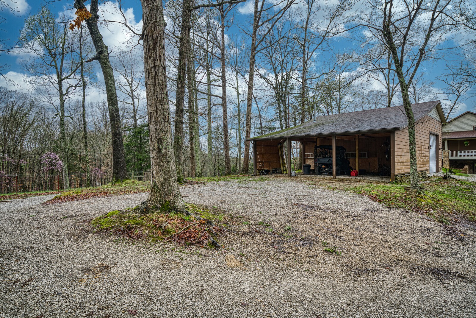 642 Campground Road Livingston, TN 38570 - Photo 34 of 49 a front view of a house with a garden