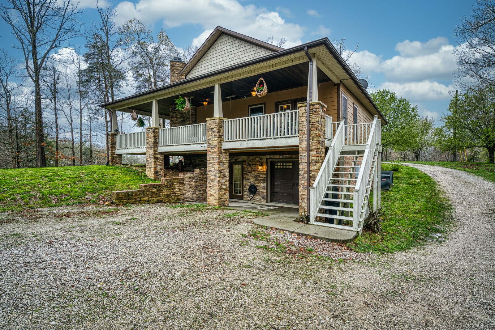642 Campground Road Livingston, TN 38570 - Photo 36 of 49 a front view of a house with garden