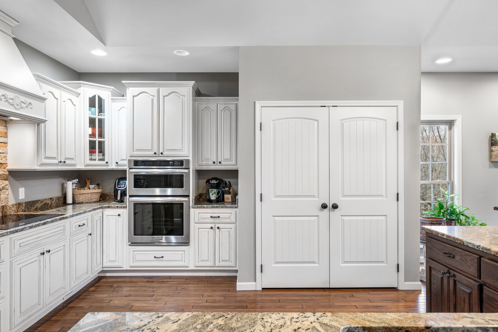 642 Campground Road Livingston, TN 38570 - Photo 8 of 49 a view of a kitchen with white cabinets