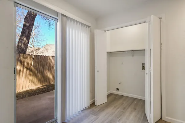 a view of a room that has a large window