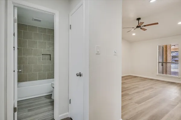 a view of an empty room and window