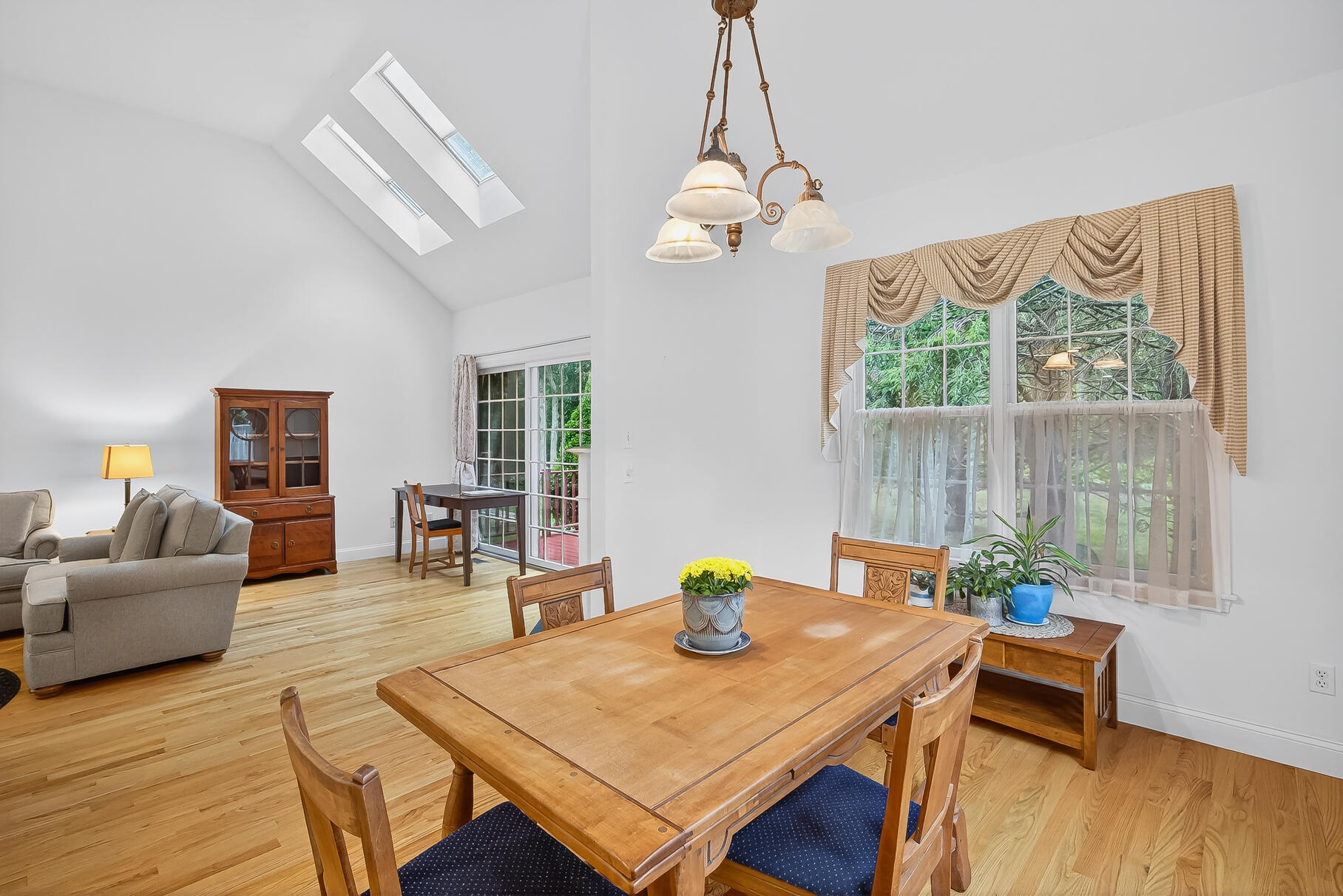 6 Mayfair Court Mashpee, MA 02649 - Photo 20 of 53 a view of a dining room with furniture window and wooden floor