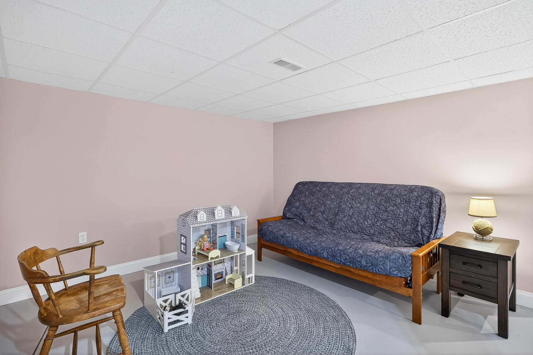6 Mayfair Court Mashpee, MA 02649 - Photo 47 of 53 a living room with a couch and a dining table