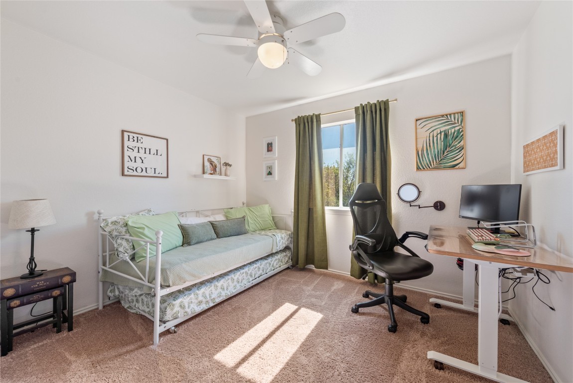 1111 Pathfinder Way Round Rock, TX 78665 - Photo 16 of 40 a living room with furniture a rug and a window