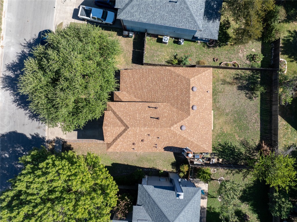 1111 Pathfinder Way Round Rock, TX 78665 - Photo 2 of 40 an aerial view of a house with a yard