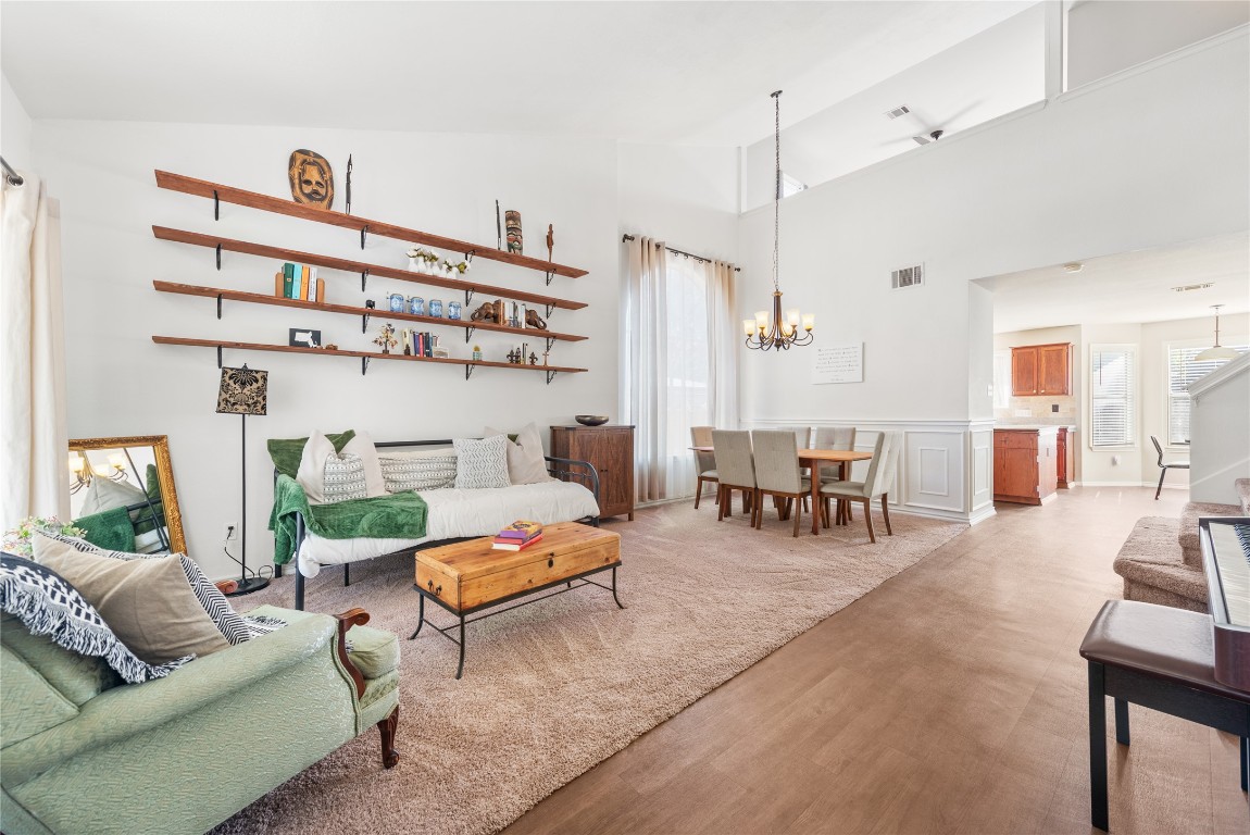1111 Pathfinder Way Round Rock, TX 78665 - Photo 4 of 40 a living room with furniture and wooden floor