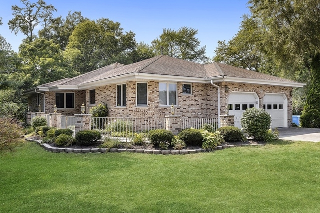 814 South Kankakee Street Wilmington, IL 60481 - Photo 1 of 1 a front view of a house with a yard and porch