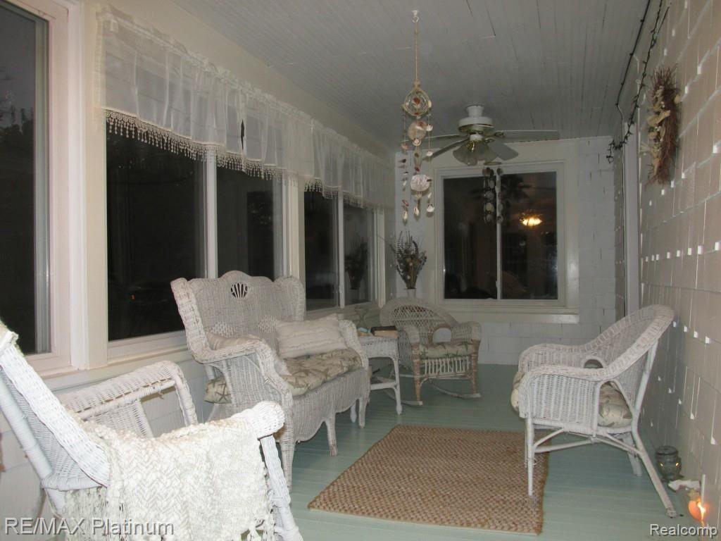315 George Howell, MI 48843 - Photo 8 of 23 ENCLOSED PORCH (NOT INCLUDED IN SQUARE FOOTAGE)