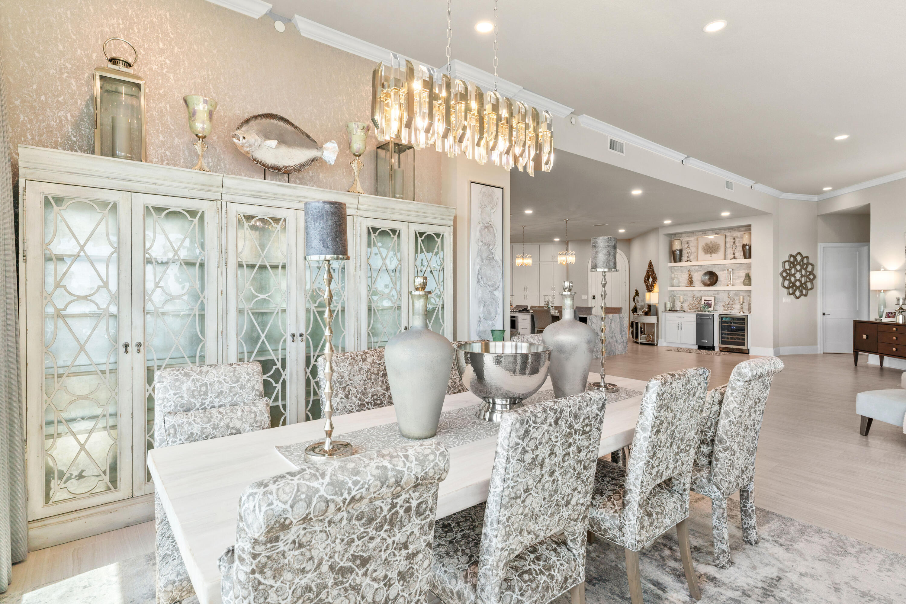 320 Harbor Boulevard, Unit 1201 Destin, FL 32541 - Photo 17 of 86 a living room with furniture a large window and chandelier